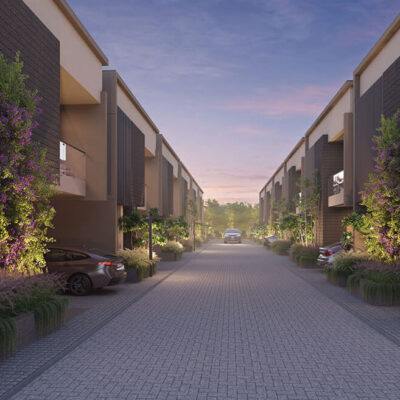 Elegant block elevation of Riviera Uno villa with tiered terraces, balconies, and landscaped frontage